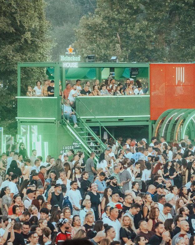 The Heineken House at Electric Castle at dusk, a packed festival crowd in front
