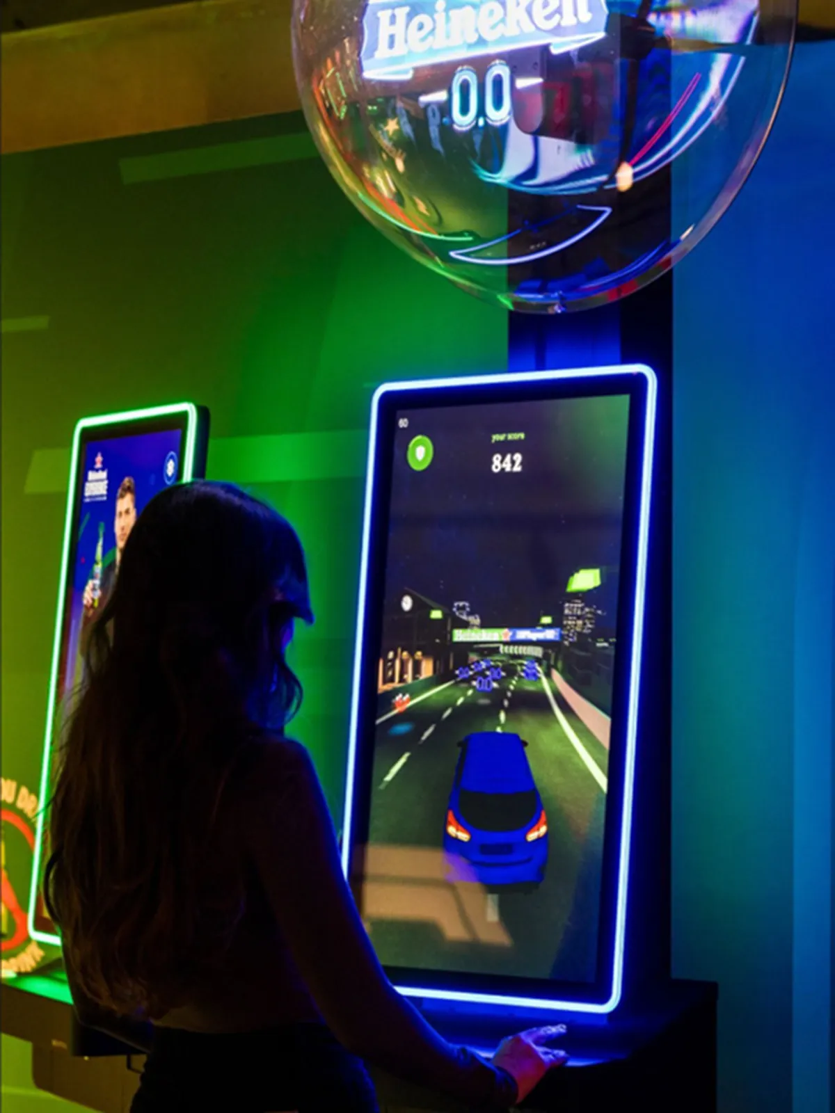 A fan racing on the Player 0.0 kiosk